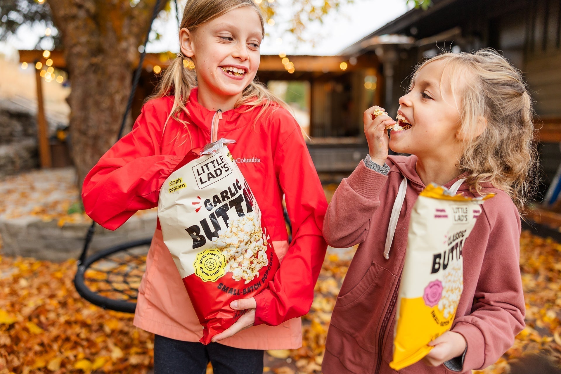 A bright bowl of Little Lad’s flavored popcorn featuring Classic Buttah, Spicy Dill Pickle, and Korean BBQ — vegan, handcrafted, and made in Vermont.