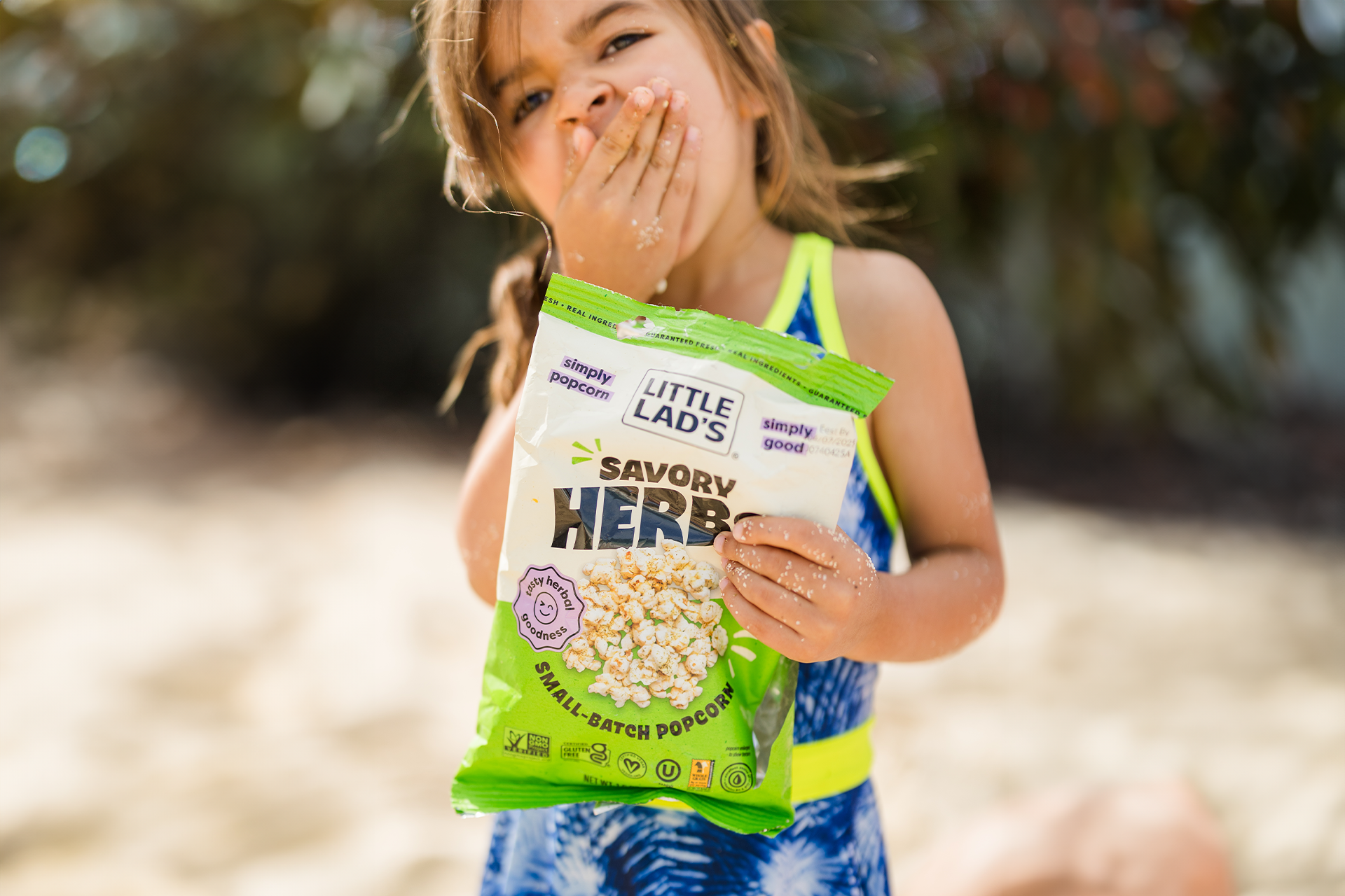 A bowl of Little Lad’s Savory Herbs Popcorn — small-batch, Vermont-made popcorn featured in a Washington Post article about healthy snacks.